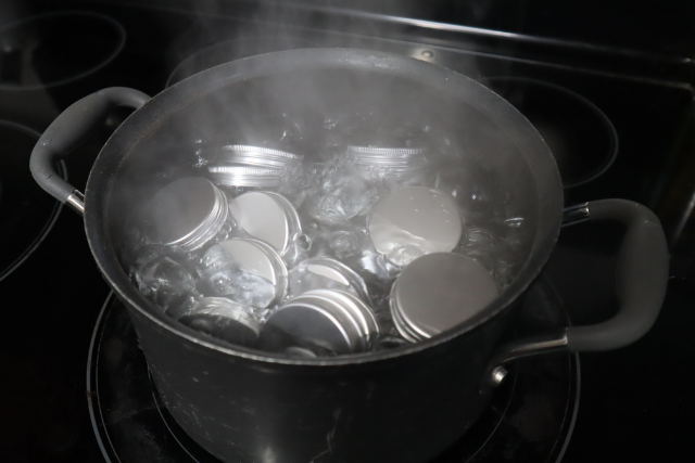 Sterilizing my 1oz tins for 10 minutes in boiling water.