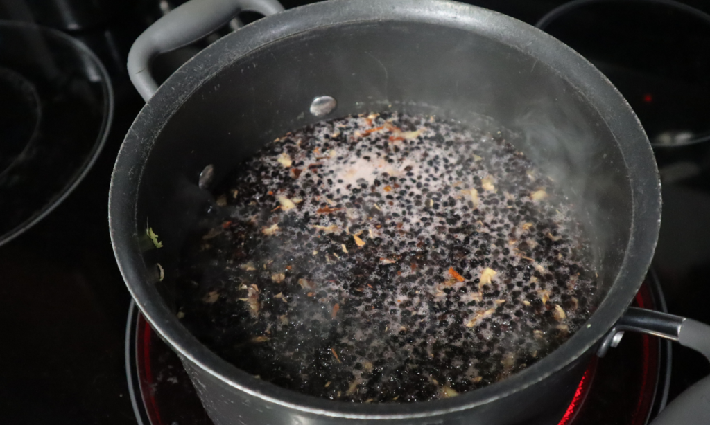 When it reaches a boil, reduce the heat and let it simmer for about 45 minutes or until reduced by half